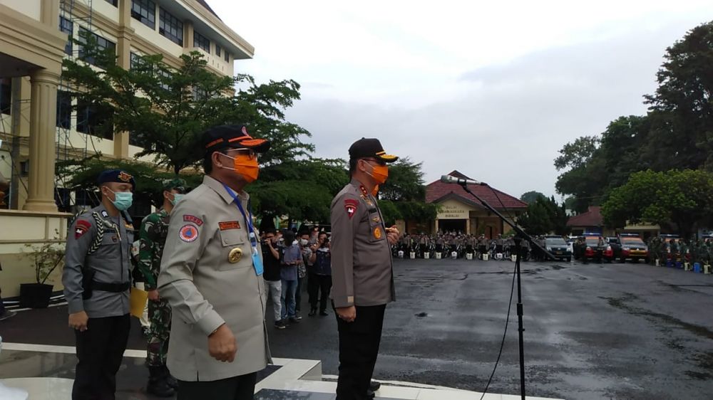 Polda Jambi bersama instansi terkait menyelenggarakan Apel Personil Gugus Tugas Penanganan Covid-19 di Lapangan depan Mapolda Jambi