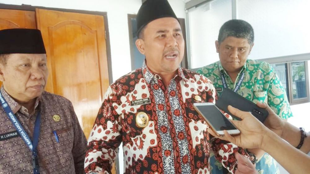 Wabup H Hillalatil Badri bersam Kepala Bappeda, H Lukman MPd dan Kabid Sapras, Bahder Johan 