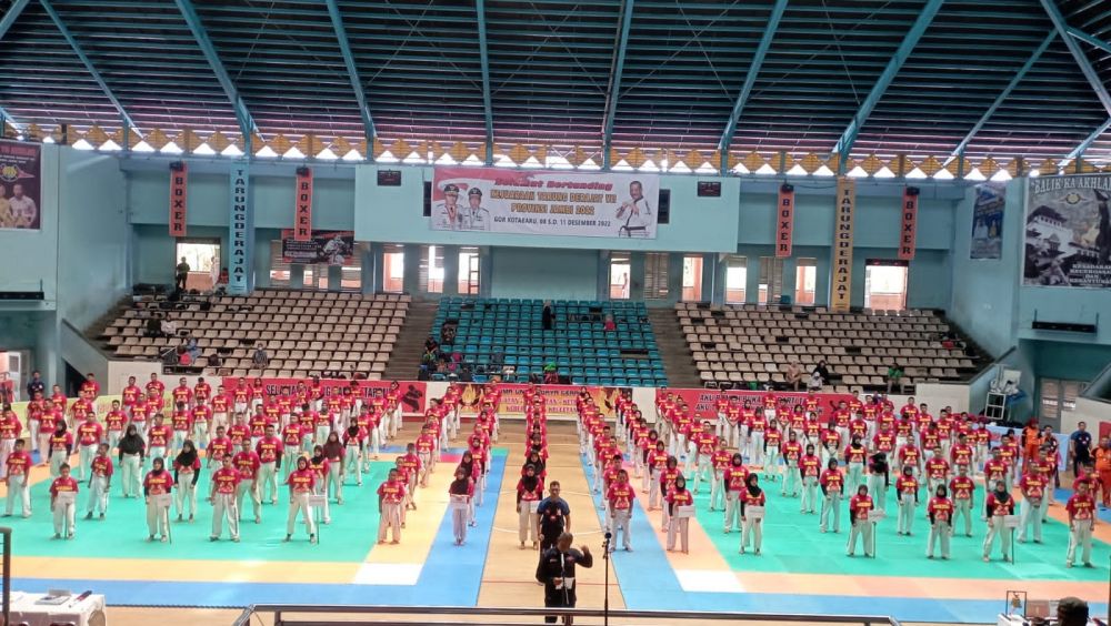 Pembukaan Kejuaraan Tarung Derajat ke VII Provinsi Jambi Tahun 2022, yang berlangsung di Gedung Olahraga Kota Baru Jambi, Kamis (08/12/2022).